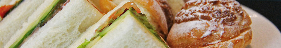 Eating Deli Sandwich at D Mongeon's Deli & Catering restaurant in Newbury Park, CA.